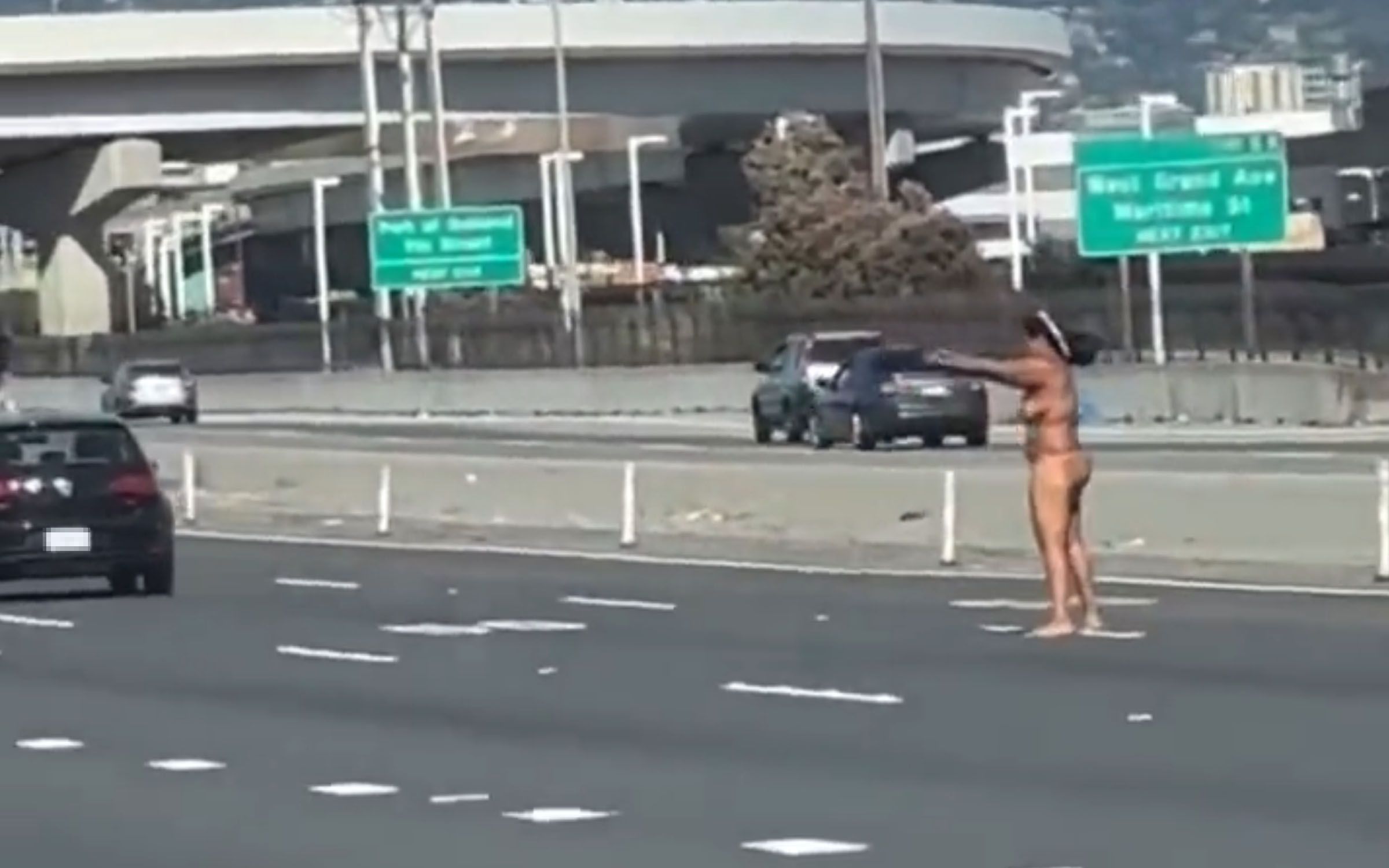 Naked Woman Flashes Knife, Fires Gun