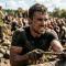Man competing alone in a demanding physical challenge, embodying raw drive and earned achievement