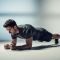 Man holding a plank position, demonstrating core strength and control