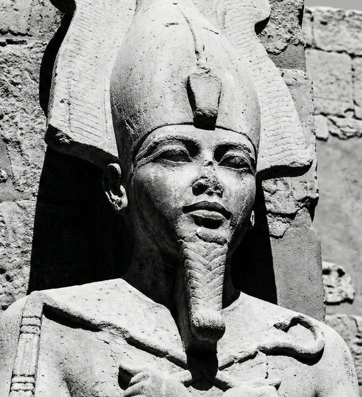 Stone carving of an ancient deity representing male strength and potency.