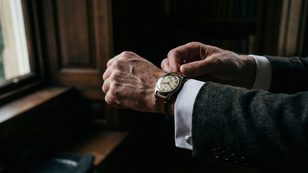 A man preparing with focus, symbolizing the mastery of sexual education and understanding.