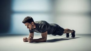 Man holding a plank position, demonstrating core strength and control